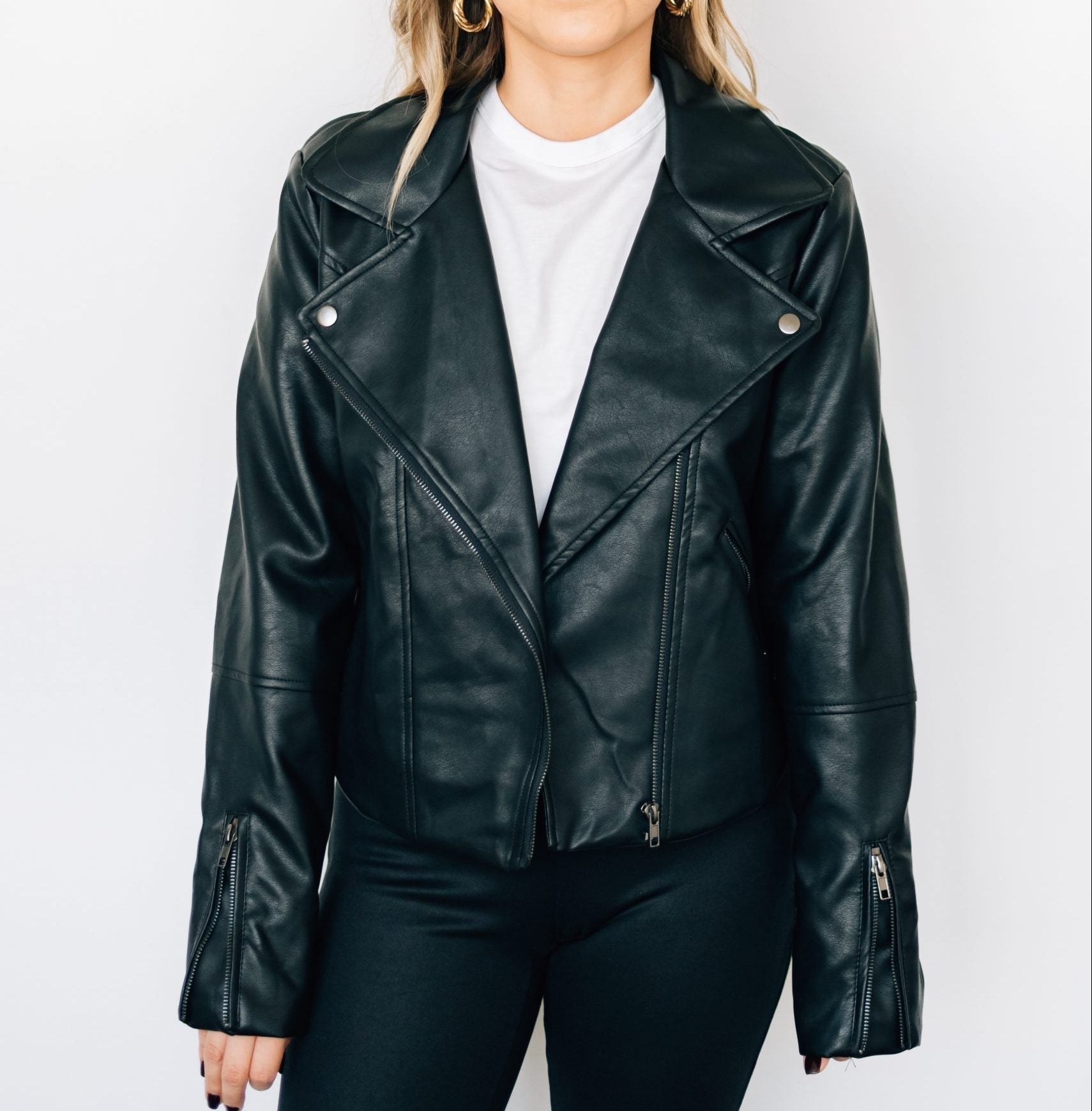 Black moto jacket with slits, perfect for an edgy look